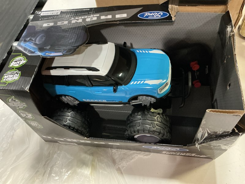 Condition photo showing As Is for adventure force (1:16) remote control ford bronco 4x4 blue/white truck, wr4-16s85u-te