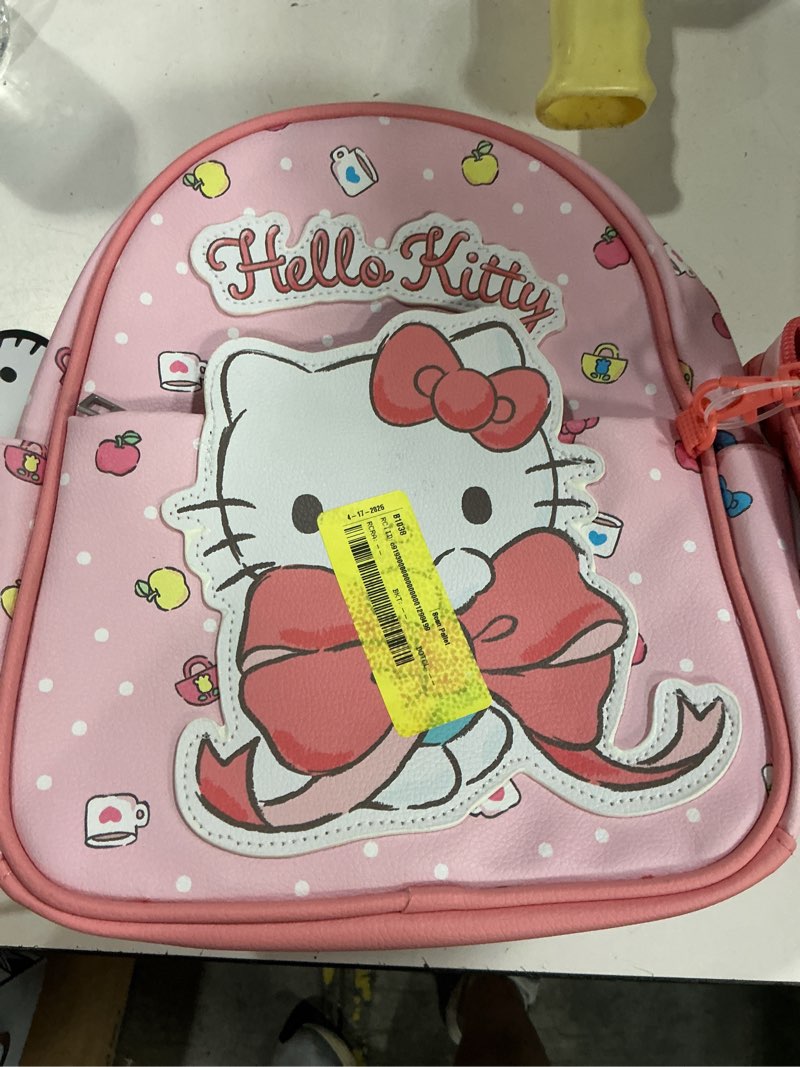 Condition photo showing Good Condition for licensed kids 10.5" mini backpack with coin purse