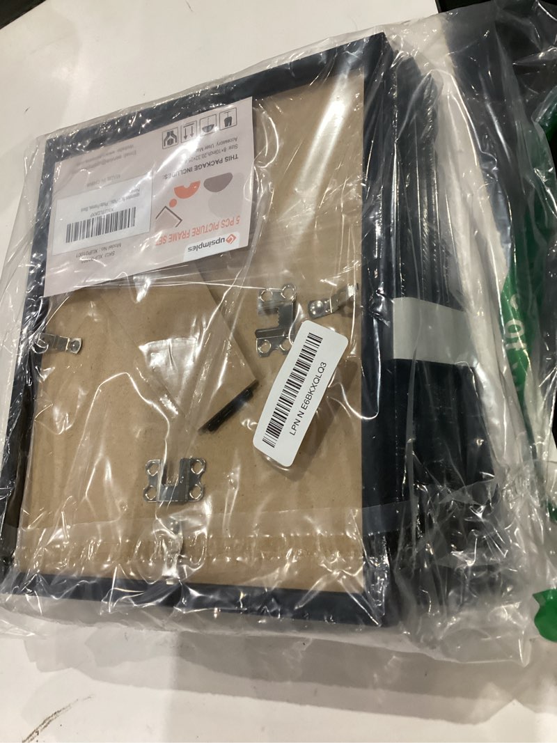 Condition photo showing As Is for upsimples 8x10 picture frame set of 5, display pictures 5x7 with mat or 8 x 10 without, wall gallery photo frames, black black 8x10