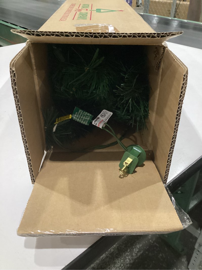 Condition photo showing As Is for National Tree Company 24 in Pre-Lit Majestic Fir Mini Artificial Christmas Tree, 35 Clear Lights, 71 Tips, Red Cloth Base, Green Plug in w/Red Bag Tree