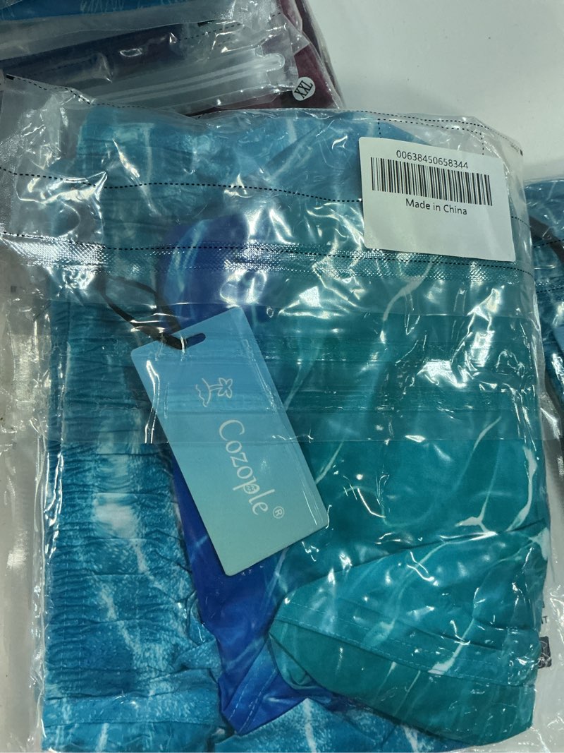 Condition photo showing New/Like New for xxl cozople mens swim trunks 5.5 inch anti-chafing bathing suit with compression liner color changing design board shorts green swimwear xxl