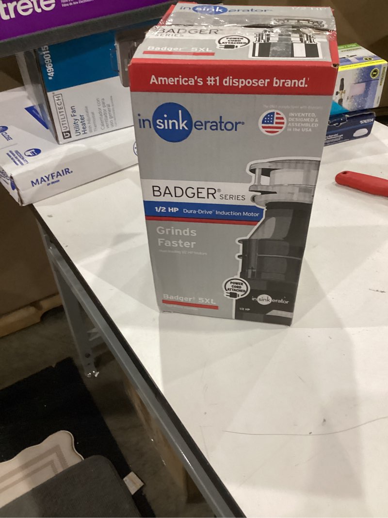 Condition photo showing As Is for similar)insinkerator garbage disposal, badger 1, standard series, 1/3 hp continuous feed, black, waterborne grey enamel