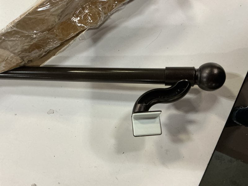 Condition photo showing Good Condition for zenna home adjustable curtain tension rod with decorative round finials, no drill window rod, easy install expandable tension curtain rod for windows, 48 to 84 inch, bronze oil rubbed bronze 48" to 84"