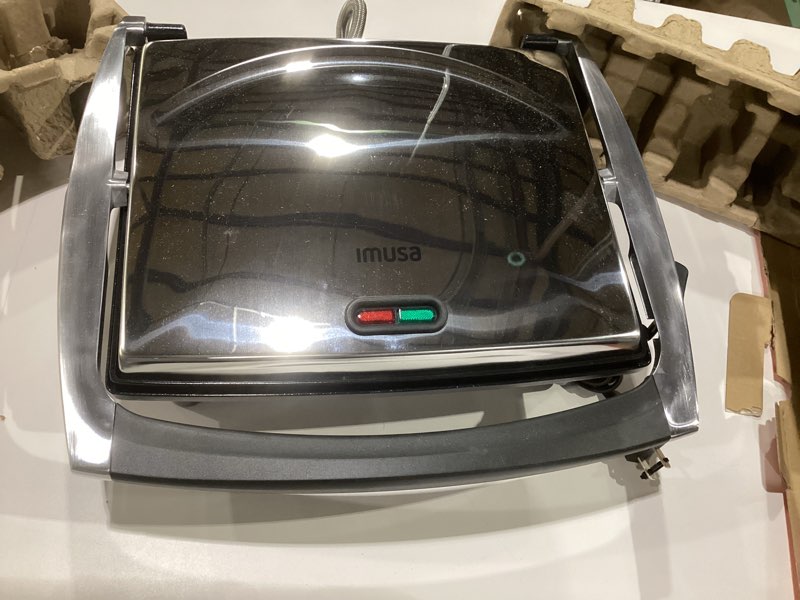 Condition photo showing Good Condition for IMUSA 12x10in Stainless Steel Electric Panini Press with Temperature Control, Nonstick Plates for Sandwiches, Grilled Paninis, Quesadillas, and More 12 x 10 inches (Pack of 1) Ceramic, NOT TESTED