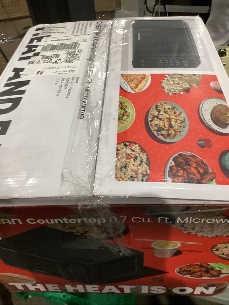 Condition photo showing As Is for Chefman Countertop Microwave Oven 0.7 Cu. Ft., 700 Watts with 10 Power Levels, 6 Cooking Presets with One-Touch Express Cook, Eco Mode, Child Safety Lock, & Mute Button - Black