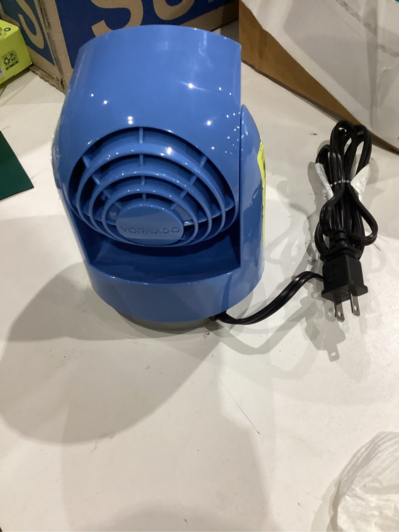 Condition photo showing As Is for vornado flippi v6 compact air circulator fan, quiet portable travel fan for desk or bedroom, adjustable head, 2 speeds,  blue