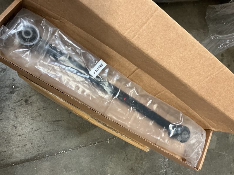 Condition photo showing As Is for dorman 528-097 rear lower suspension trailing arm compatible with select toyota models