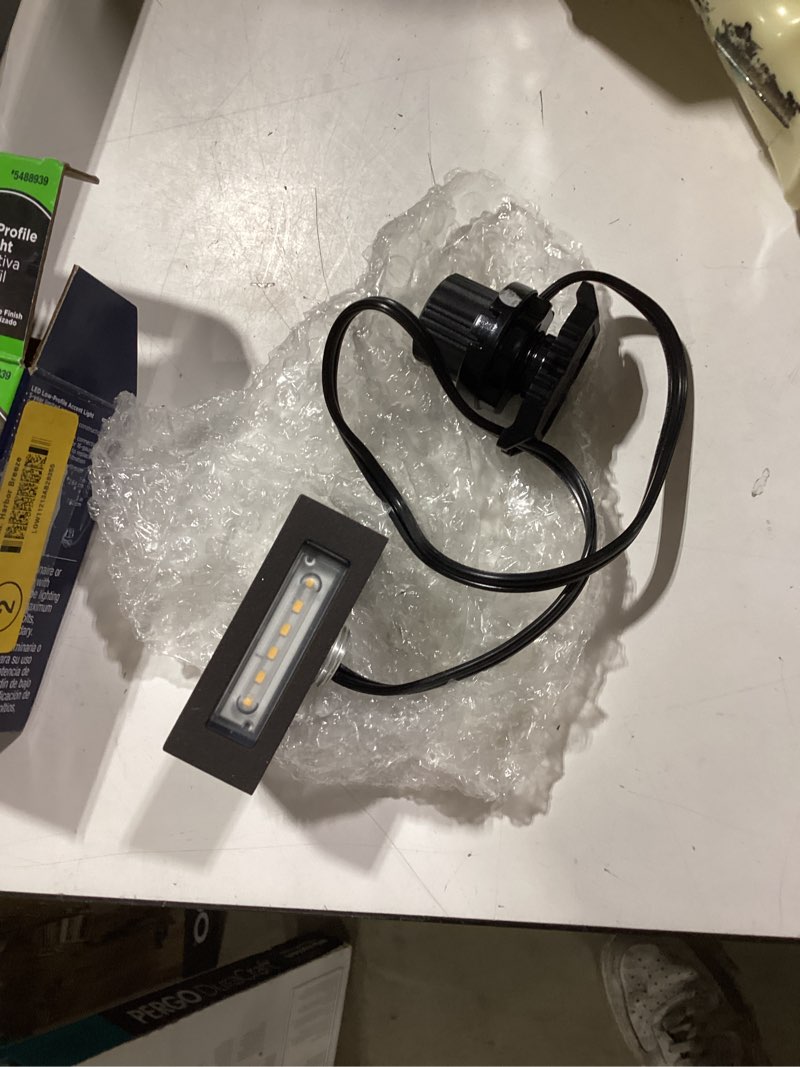 Condition photo showing As Is for harbor breeze 200-lumen 2.6-watt specilaty textured bronze low voltage hardwired led outdoor path light (3000 k)