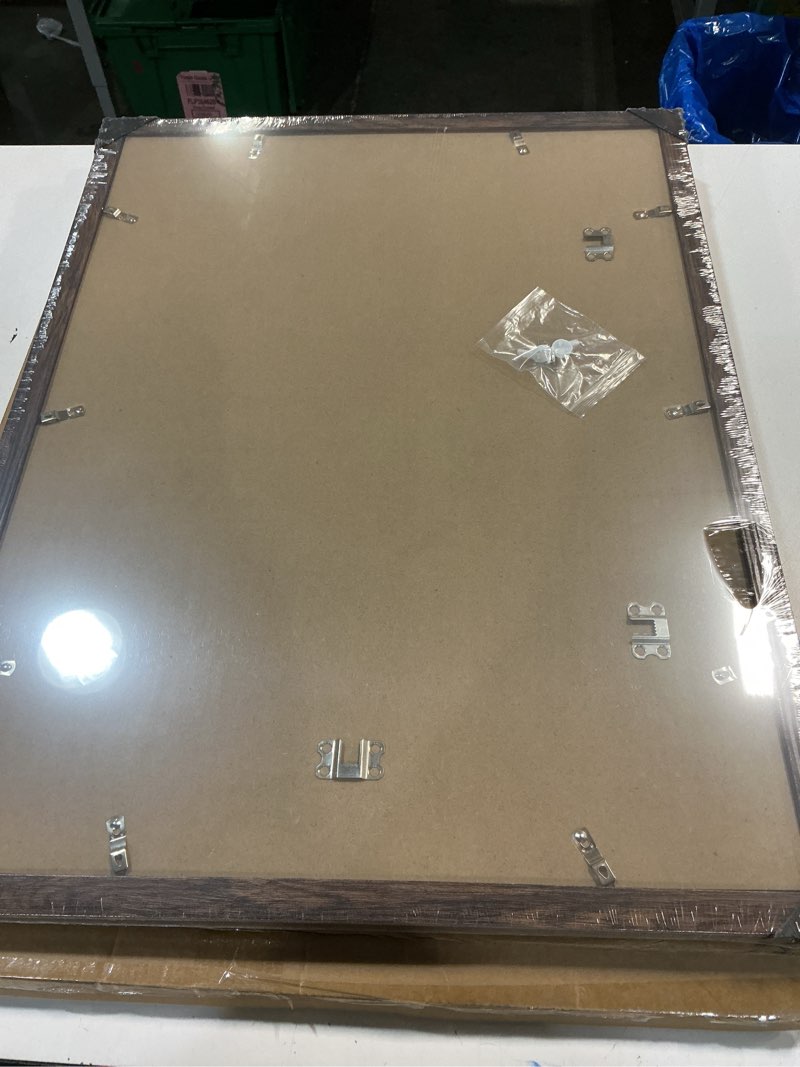 Condition photo showing New/Like New for set of 2 wood grain picture frames 19.5”x25.5” (similar to stock photo)