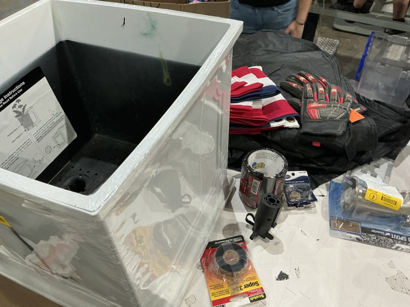 Condition photo showing As Is for assorted home improvement lot (small tools, screw, home accessories, etc.)