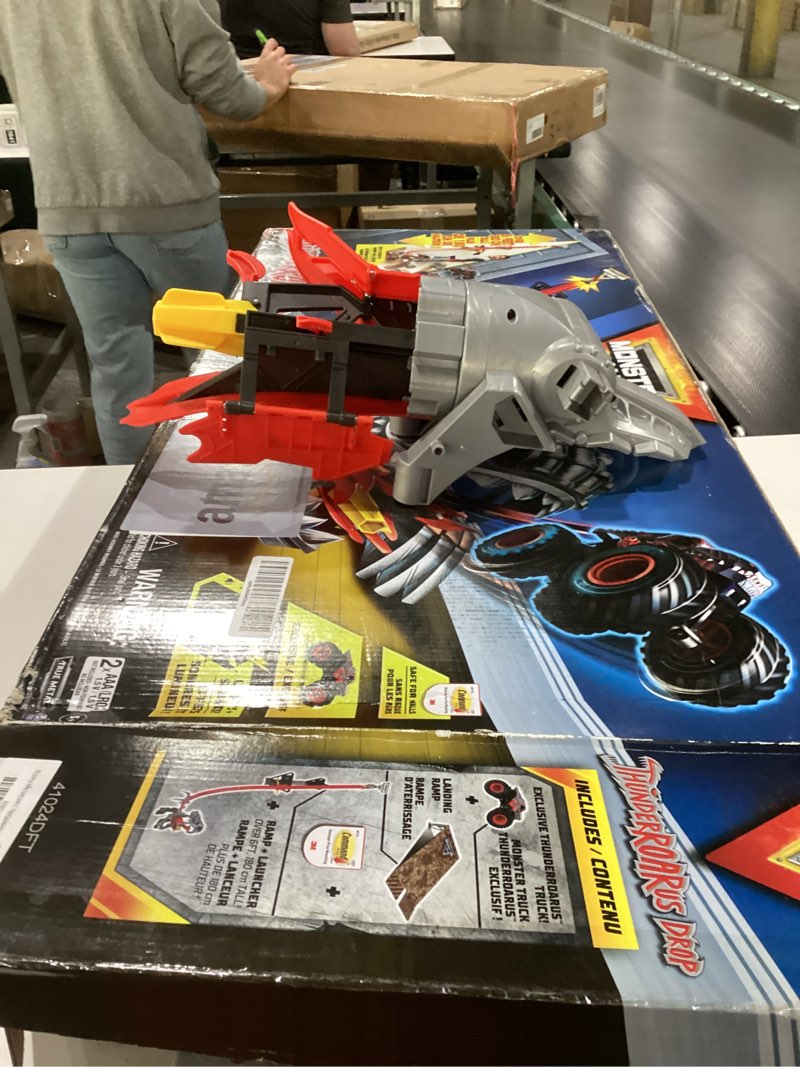 Condition photo showing New/Like New for Monster Jam ThunderROARus Drop Playset with Exclusive Monster Truck, Over 6 Feet Tall, Lights & Sounds, Kids Dinosaur Toys for Boys and Girls Ages 4 and Up