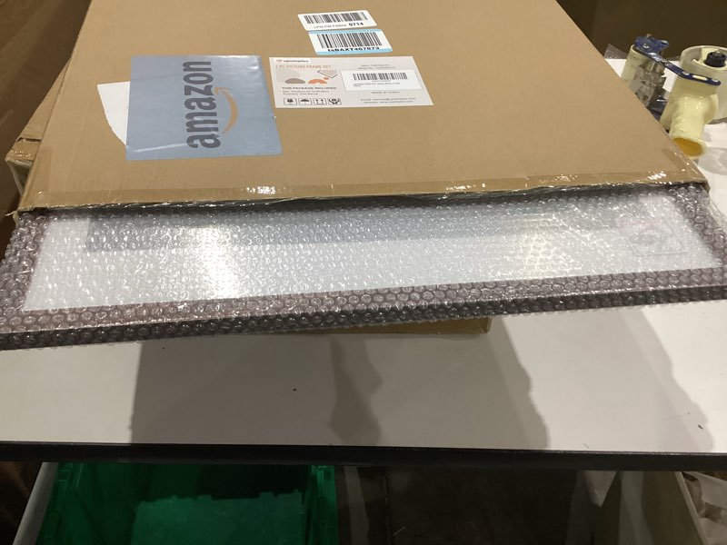 Condition photo showing New/Like New for upsimples 18x24 Picture Frame, Display Pictures 16x20 with Mat or 18 x 24 Without, Wall Hanging Poster Frames, Brown, 1 Pack Brown 18x24