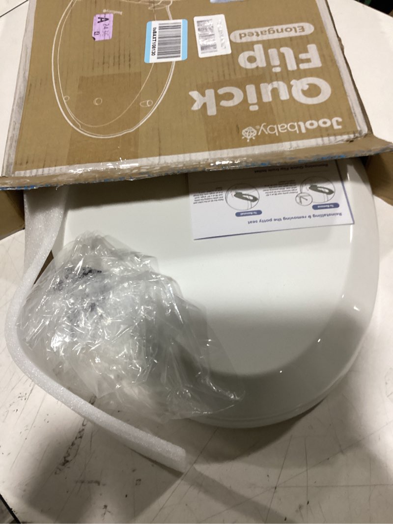 Condition photo showing Good Condition for jool baby quick flip toilet seat with built-in potty & splash guard for toddler training, slow close (elongated) oblong