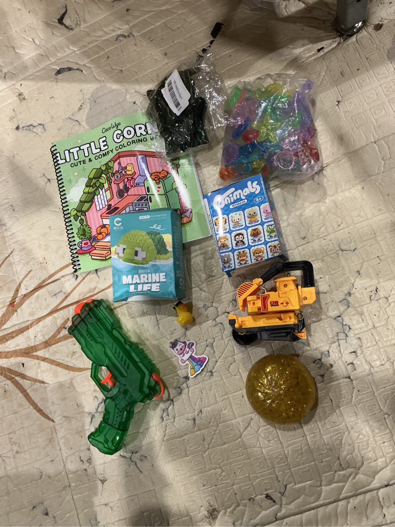 Condition photo showing As Is for assorted lot of toys and games kids
