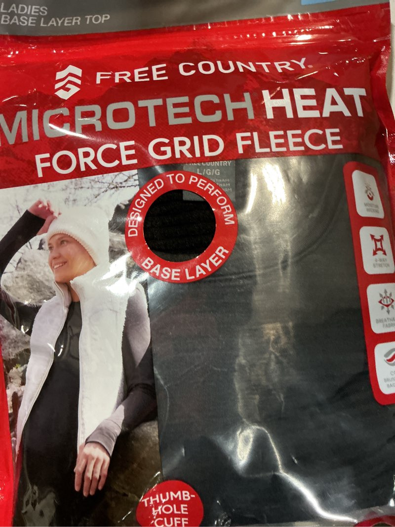 Condition photo showing New/Like New for large women's force grid fleece base layer top black 
