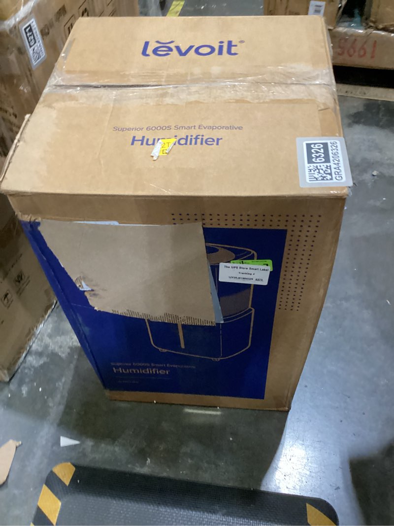 Condition photo showing As Is for humidifier