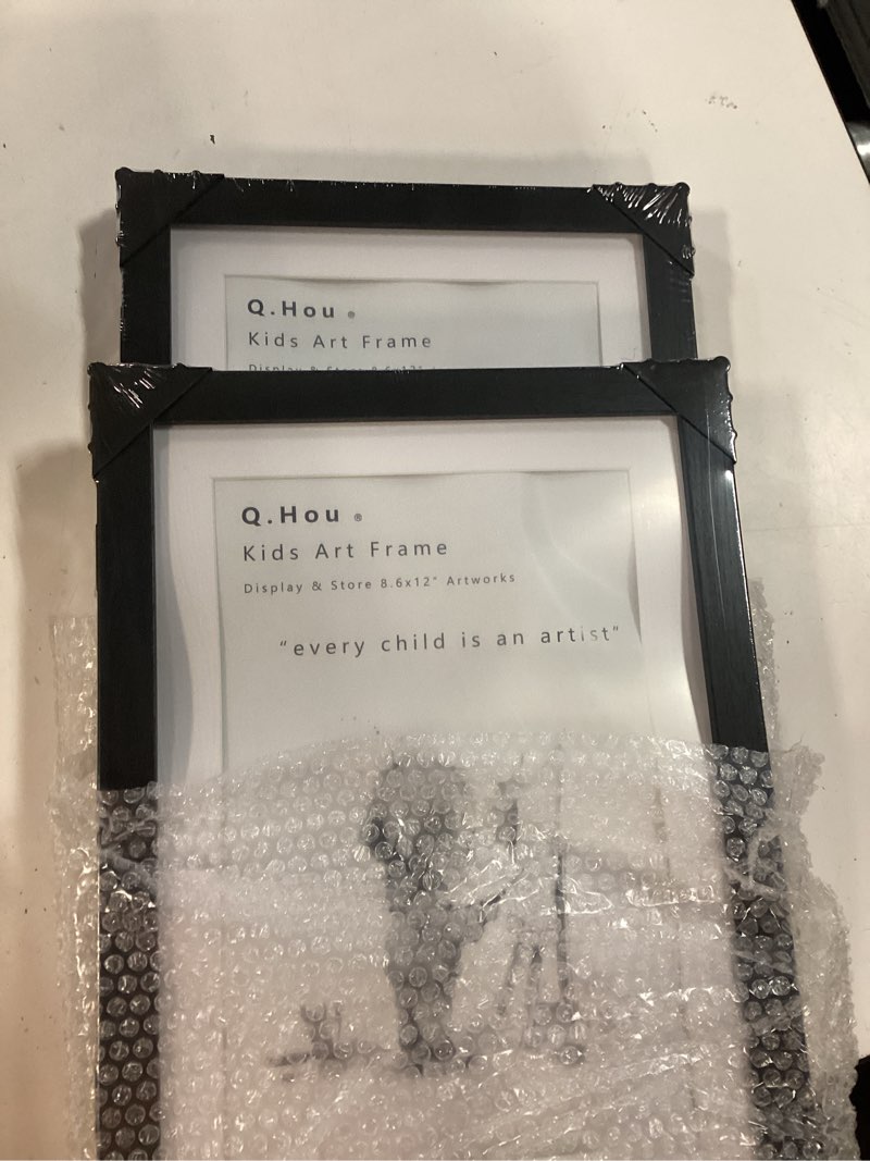 Condition photo showing New/Like New for 4 pack kids artwork frames changeable 8.5 x 11 inch children art projects children art frames front opening picture display frame holds 150 drawings for craft storage, room decor, portfolio, black 8.5"x11", black 4