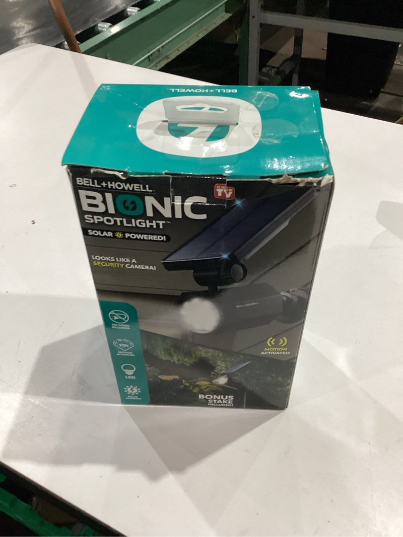 Condition photo showing As Is for bell & howell bionic motion-sensing solar powered led black spotlight