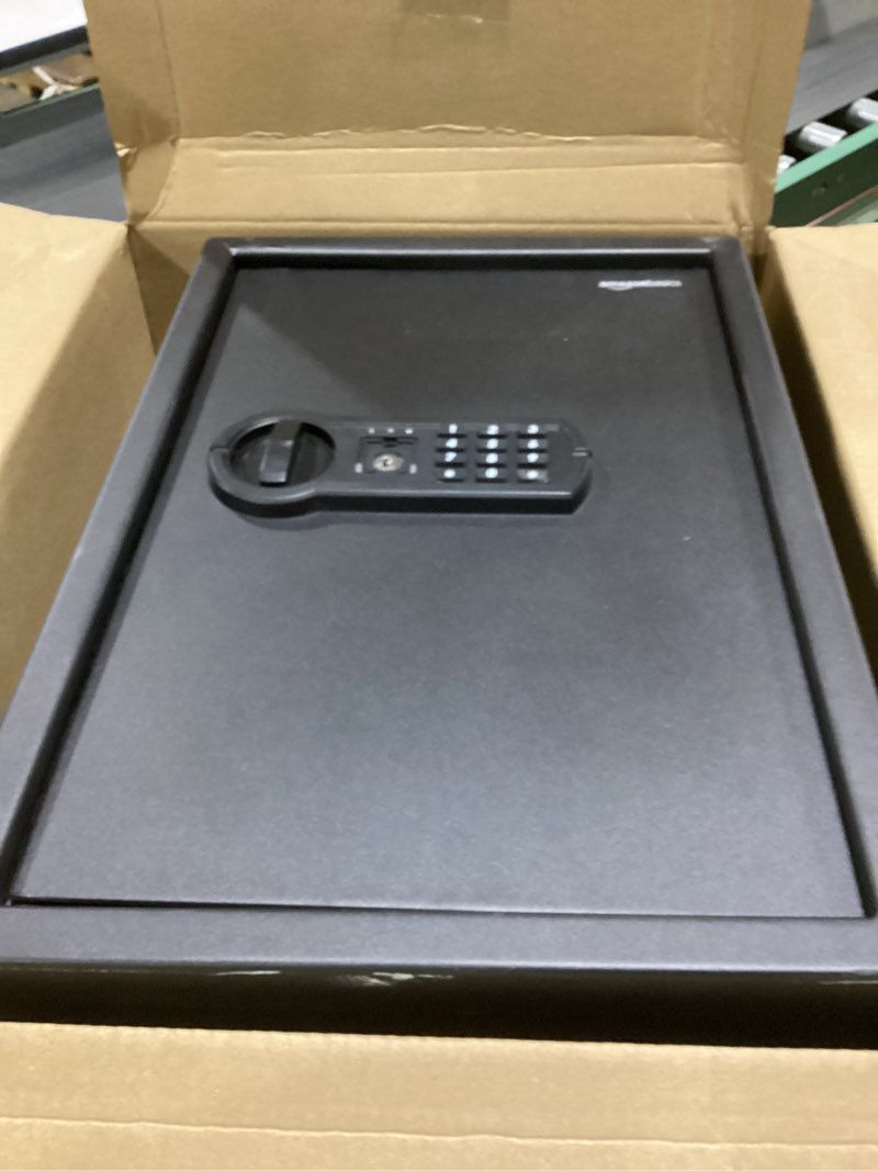 Condition photo showing Good Condition for Amazon Basics Steel Home Security Electronic Safe with Programmable Keypad Lock for Documents, Jewelry, Valuables, 1.8 Cubic Feet, Black, 13.8"W x 13"D x 19.7"H 1.8 Cubic Feet Keypad Lock