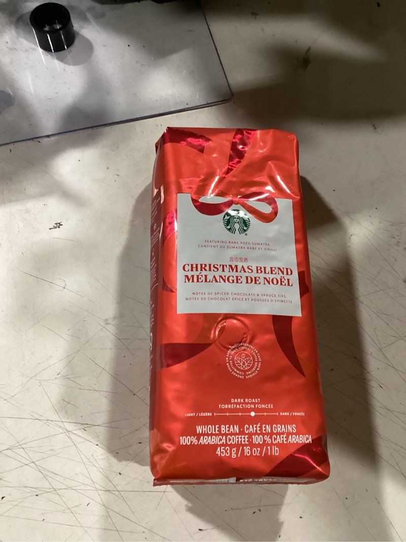 Condition photo showing New/Like New for starbucks christmas blend whole bean coffee 16oz, dark roast 100% arabica, rich spiced chocolate & spruce notes, limited holiday edition, bold, festive flavor from sumatra & latin america