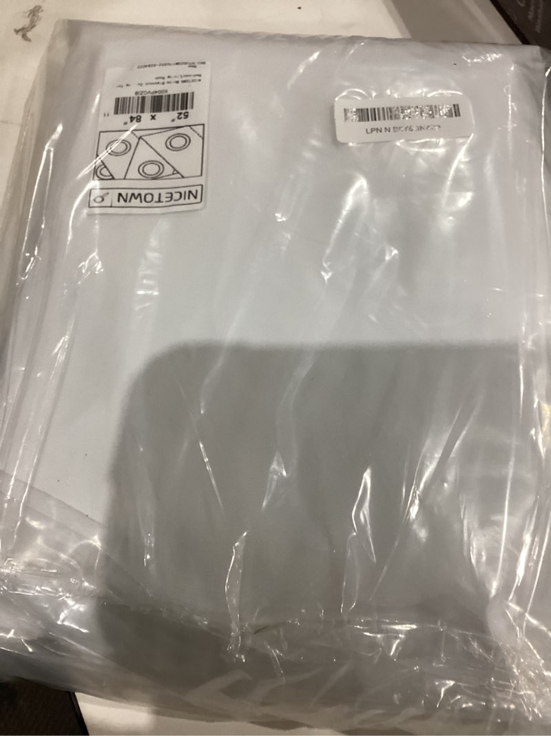 Condition photo showing As Is for NICETOWN White Blackout Curtains W52 x L84 2 Panels, Grommet Full Blackout Window Treatments Heat Blocking for Bedroom/Living Room 100% Blackout White 52"W x 84"L (Pack of 2)