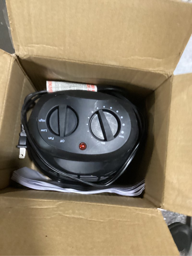 Condition photo showing Good Condition for 1500-watt black desktop electric ceramic space heater
