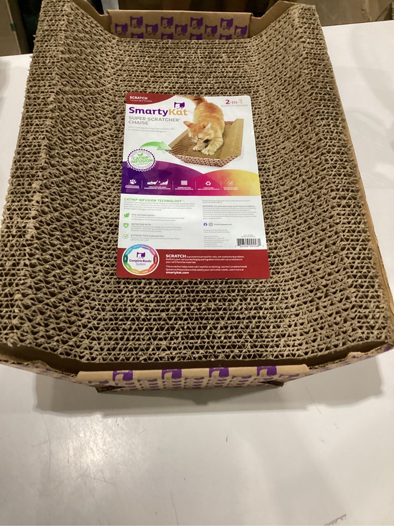Condition photo showing New/Like New for smartykat super scratcher chaise corrugate cat scratcher and lounge, cradling chaise shape for scratching & comfort one size super scratcher chaise