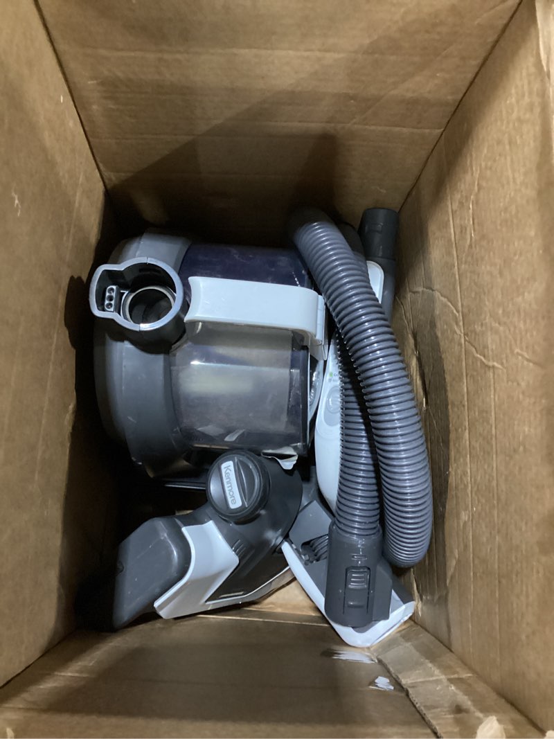 Condition photo showing As Is for Kenmore DC5070 500 Series Bagless Canister Vacuum with Hair Eliminator Brushroll?2-Motor Cyclonic Technology, HEPA Filtration & 24' Auto Cord Rewind for Pet, Carpets, Hard Floors, Stairs, White Hair Eliminator Bagless Canister