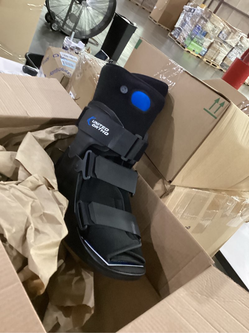 Condition photo showing Good Condition for united ortho short air cam walker fracture boot, extra large, black black extra large boot