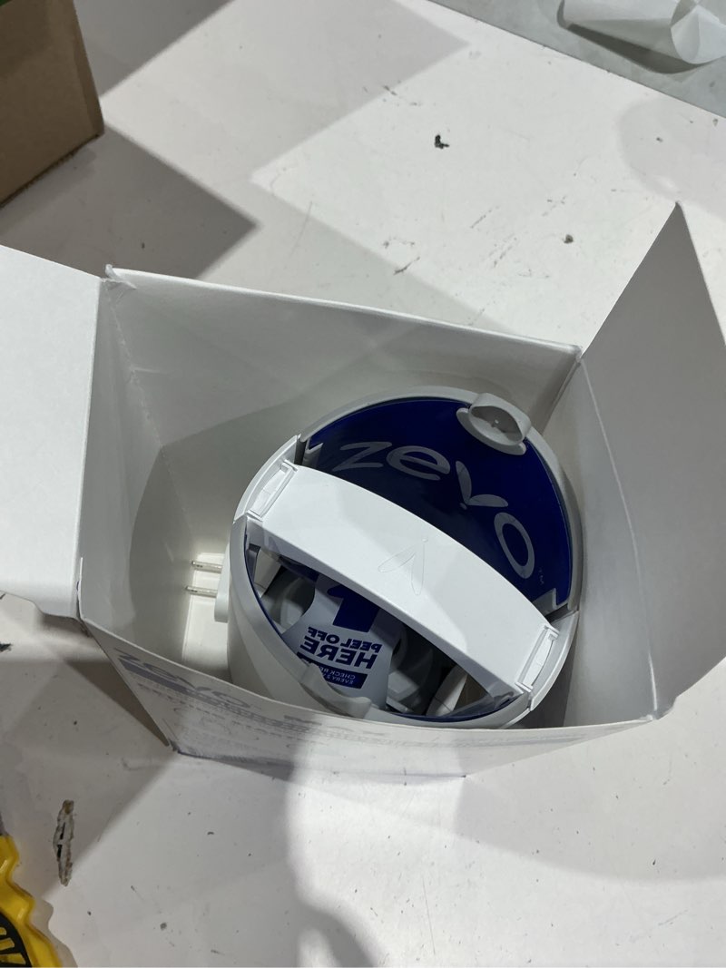 Condition photo showing As Is for zevo max bug catcher & fly trap for indoors - flying insect trap for gnats, house & fruit flies - use in any room - no-mess disposal (1 plug in base & 2 cartridges) 1 device & 2 cartridges