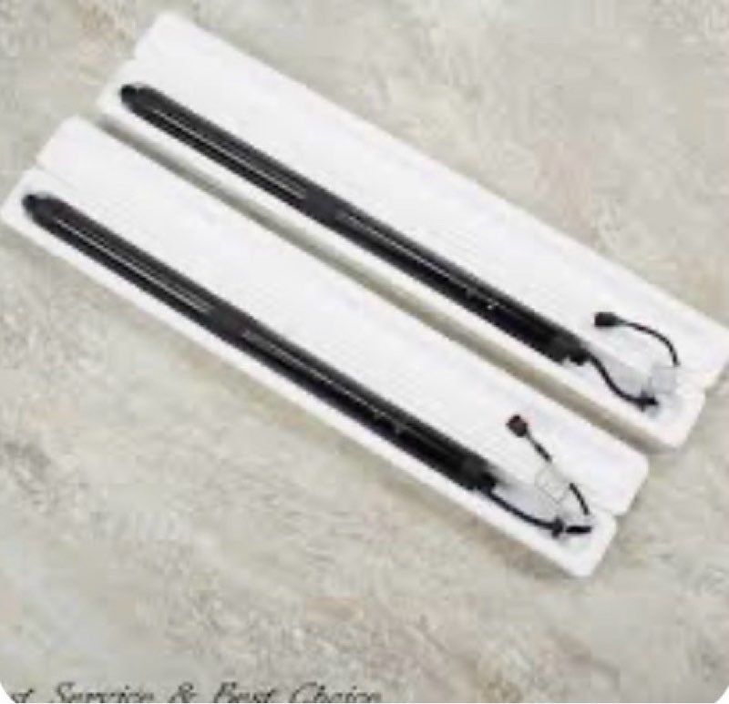 automatic tailgate damper struts for a car, which are motorized lift supports designed to open and close a vehicle's rear trunk door automatically (unknown make and model)