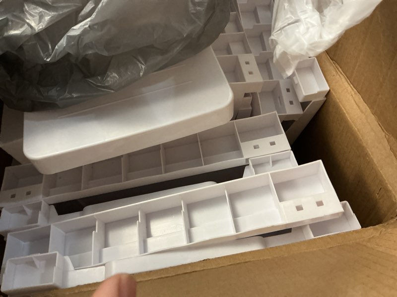 Condition photo showing As Is for conworld super light weight slim plastic bathroom storage, self-assembling organizer 5 tier cart with 4 wheels (product comes with installation instructions and video)