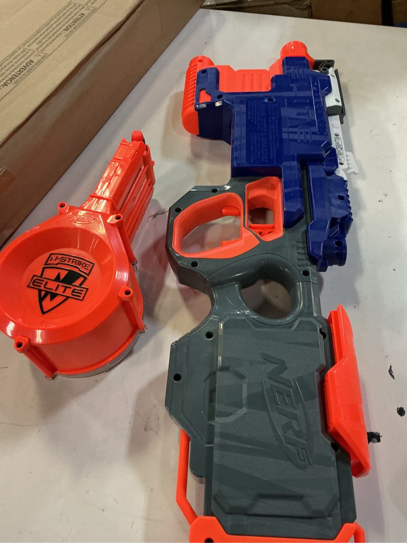 Condition photo showing As Is for nerf hyperfire motorized elite blaster, 25-dart drum, fires up to 5 darts per second, includes 25 official elite darts (amazon exclusive)