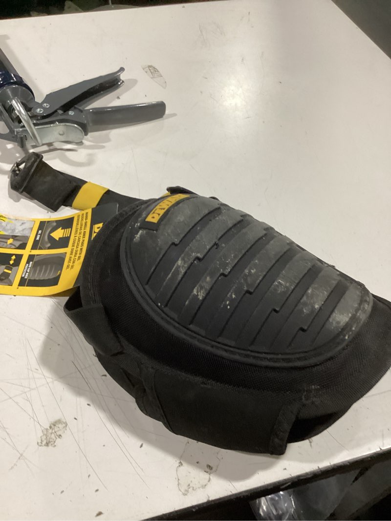 Condition photo showing As Is for dewalt hard shell knee pads