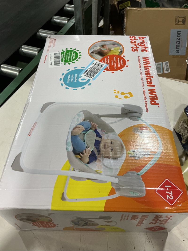 Condition photo showing New/Like New for bright starts portable automatic 6-speed baby swing with adaptable speed, taggies, music, removable-toy-bar, 0-9 months 6-20 lbs (whimsical wild)