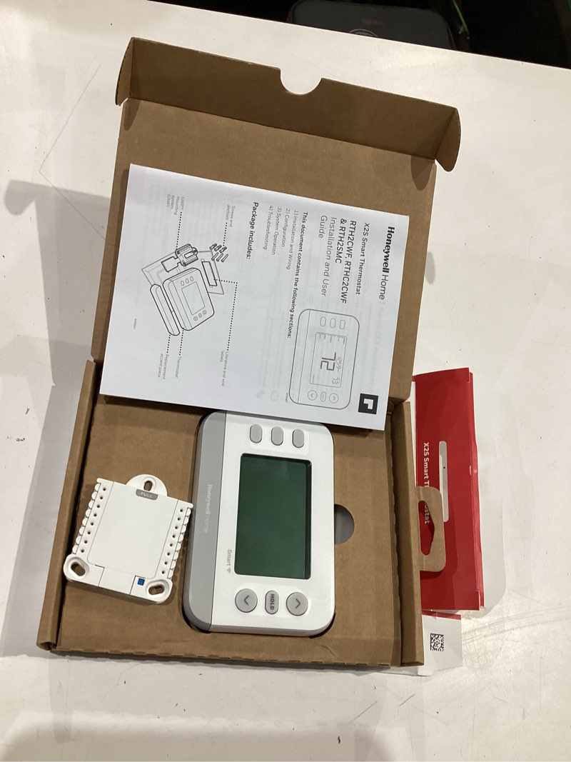 Condition photo showing As Is for honeywell home x2s smart built in wifi heating and cooling push button smart-enabled programmable th