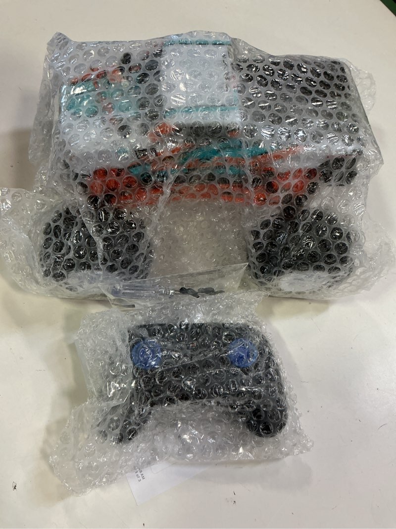 Condition photo showing New/Like New for 1:16 Scale RC Monster Truck - 2.4GHz All Terrain Car for Kids 4-12, 20 Km/h Off Road RC Truck, Christmas or Birthday Gift Orange