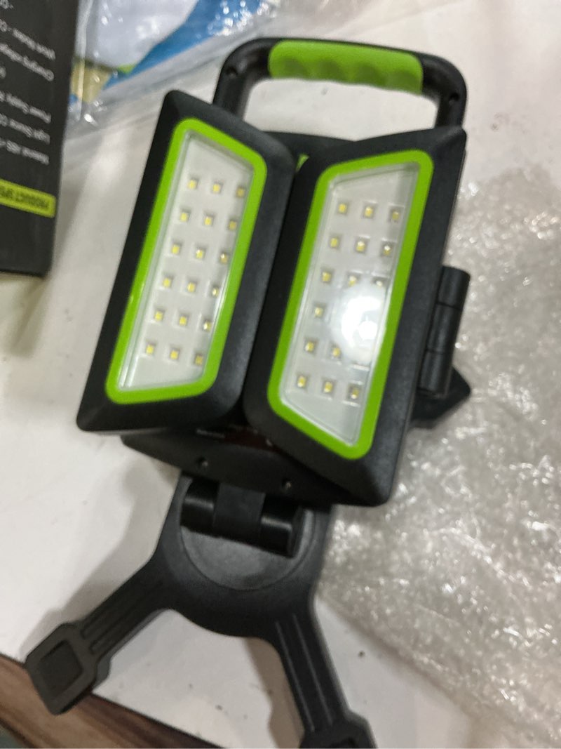 Condition photo showing New/Like New for sylstar 30w rechargeable led work light, 3000lm magnetic, 5 modes, 360 rotatable & foldable, waterproof for garage, job site, camping, car repairing green