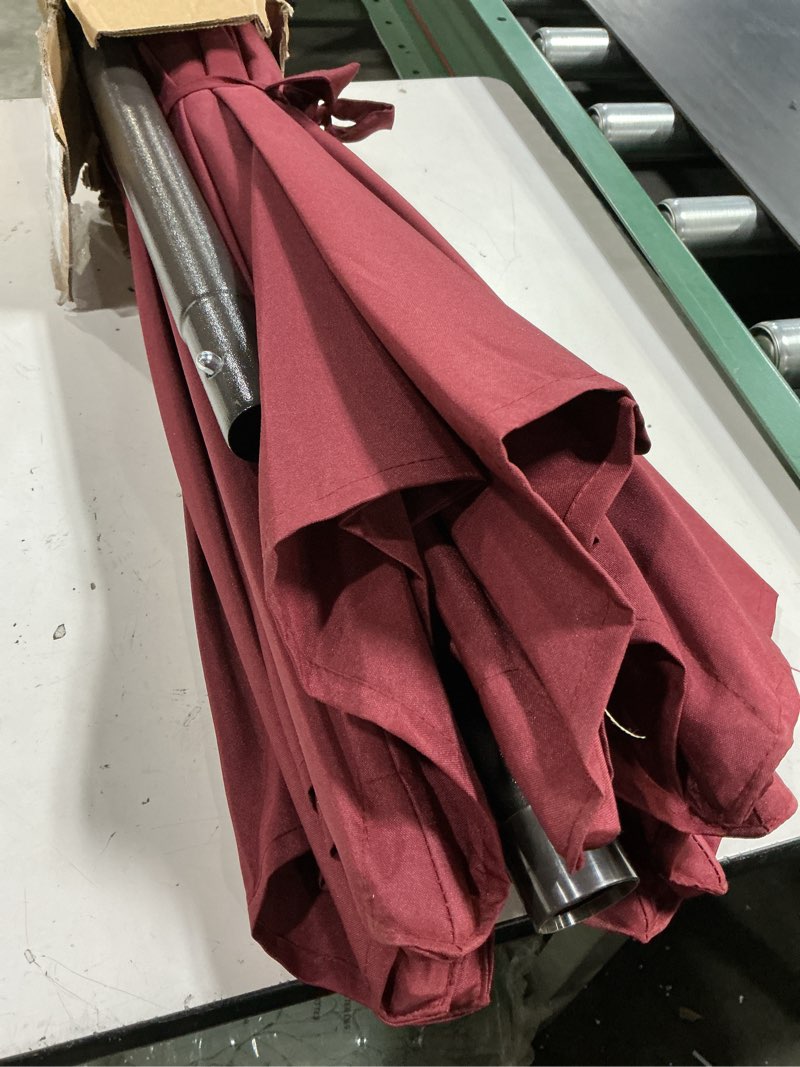 Condition photo showing Good Condition for blissun 9' outdoor patio umbrella, outdoor table umbrella, yard umbrella, market umbrella with 8 sturdy ribs, push button tilt and crank burgundy