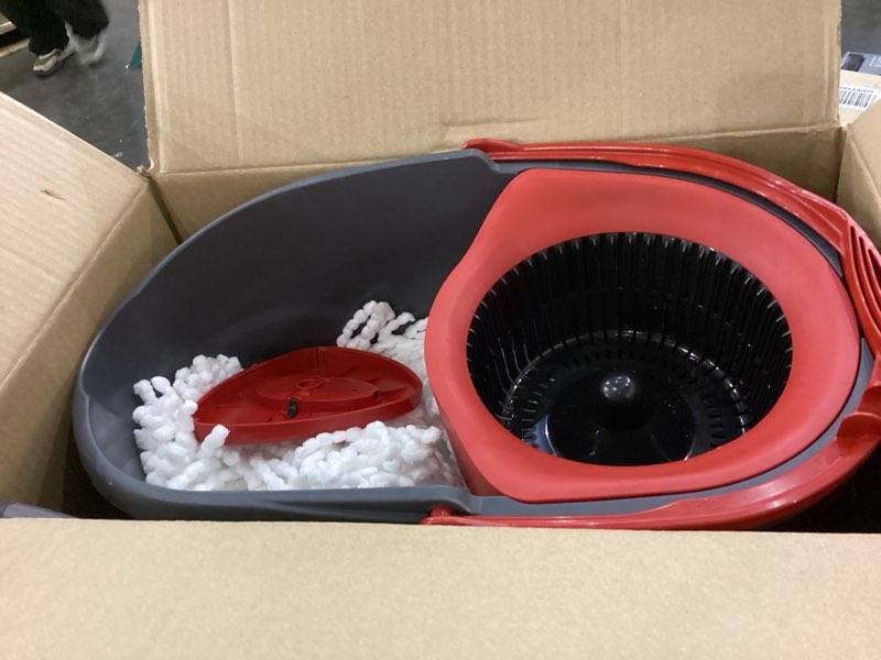 this is an o-cedar easywring spin mop & bucket system with 2 refills.  