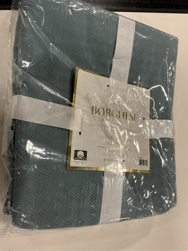 Condition photo showing New/Like New for borghese twin/twin xl roma luxe cotton blanket storm green