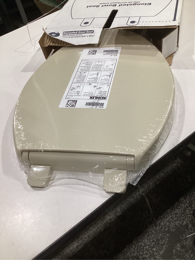 Condition photo showing Good Condition for kohler k-4774-47 brevia elongated toilet seat with quick-release hinges and quick-attach hardware for easy clean, almond elongated almond
