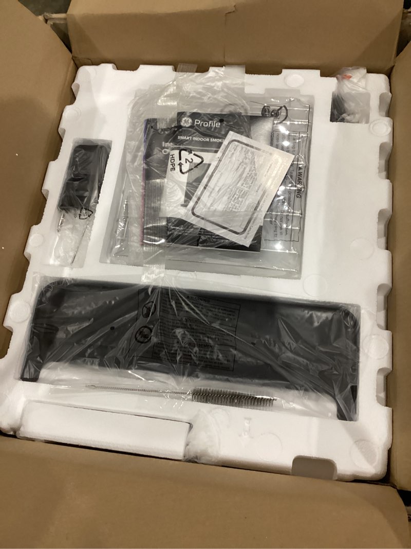 Condition photo showing Good Condition for ge profile™ smart indoor pellet smoker, with active smoke filtration, 5 smoke control settings, wifi connected, electric, countertop bbq appliance, black