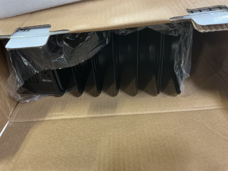 Condition photo showing As Is for Utilitech 1500 -Watt Oil-filled radiant Utility Indoor Electric Space Heater with Thermostat