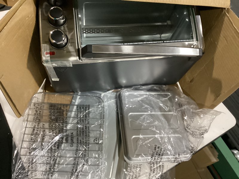 Condition photo showing As Is for black+decker to1313sbd toaster oven, 15.47 inch, silver