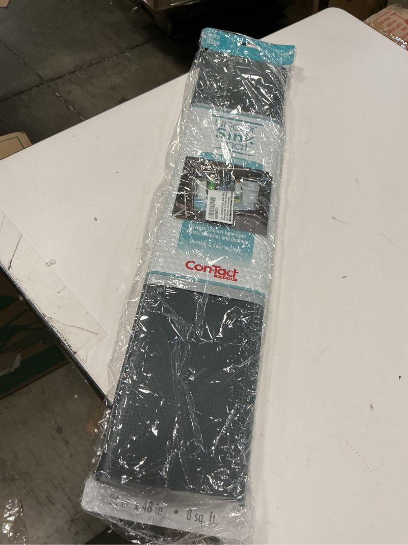 Condition photo showing New/Like New for Con-Tact Brand Under Sink Mat, Waterproof Mat for Under Kitchen Sink, Bathroom, and Laundry Room, Non-Adhesive and Durable Shelf Liner, Easy to Clean, 24" x 48", Graphite