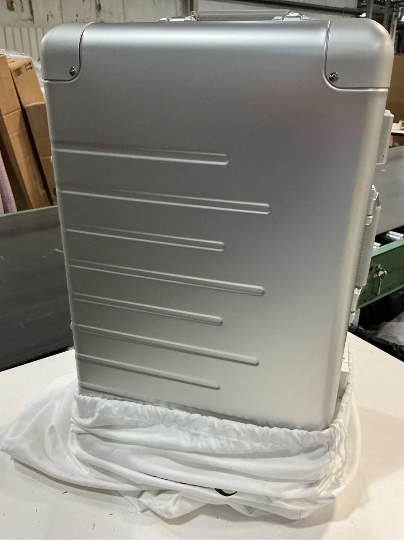 Condition photo showing As Is for (SCRATCHES) Expandable Small Carry-On Suitcase, Silver