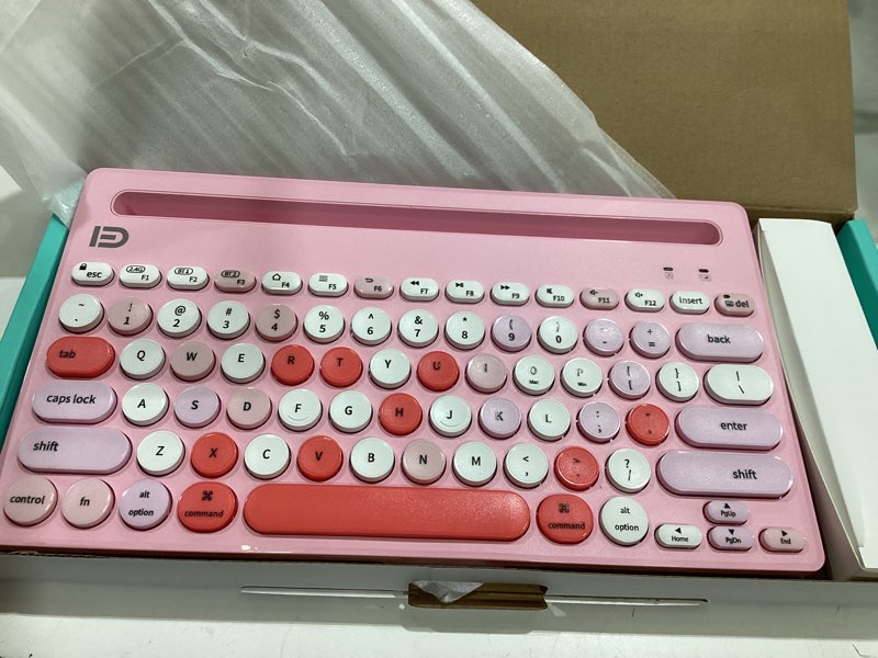 Condition photo showing Good Condition for huo ji wireless keyboard multi-device, bluetooth and 2.4g dual mode for ipad, switch to 3 devices for tablet, iphone, pc, smart tv, cellphone, ios android windows, pink