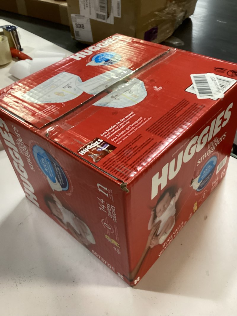 Condition photo showing New/Like New for Huggies Size Newborn Diapers, Little Snugglers Baby Diapers, Size Newborn (up to 10 lbs), 144 Count, Packaging May Vary