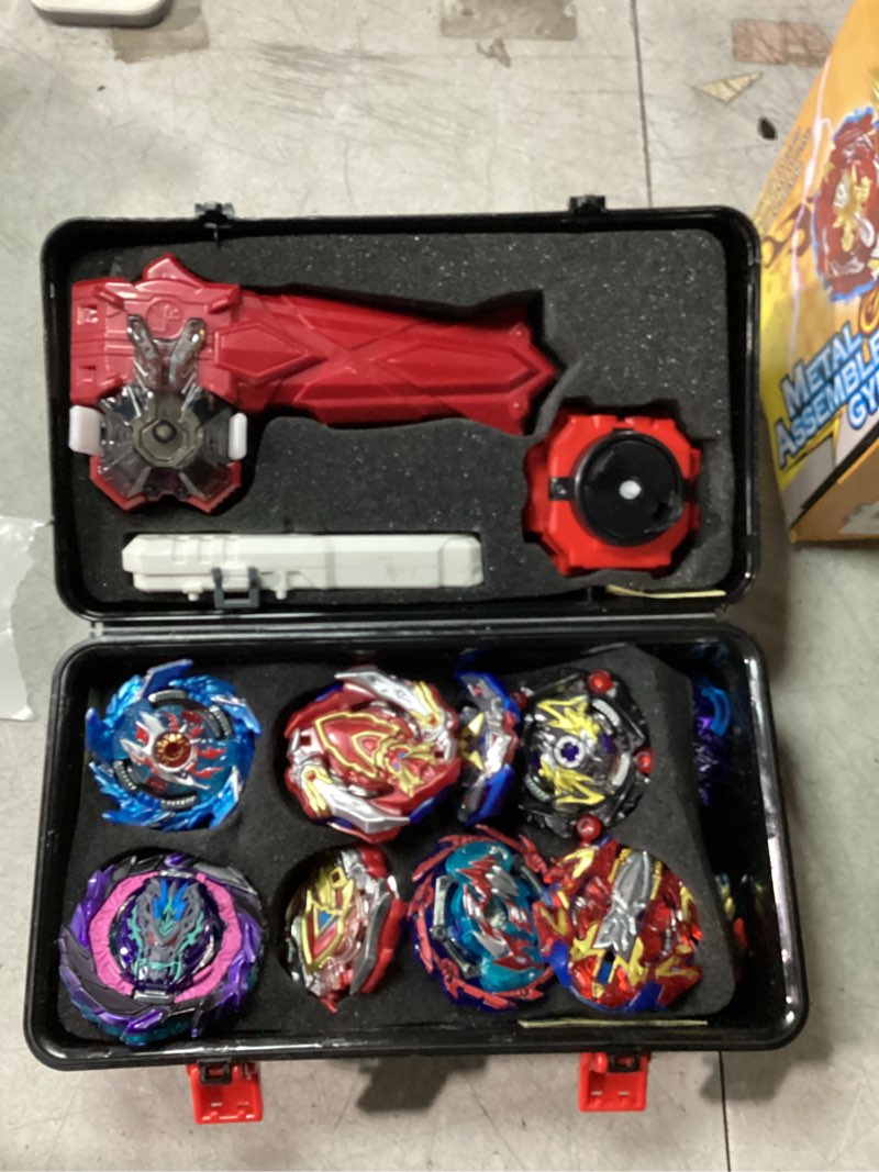 Condition photo showing Good Condition for Bey Battling Top Burst Launcher Game Set, 12 Spinning Tops Burst Gyros 3 Launchers with Storage Box Great Birthday Present for Boys Age 6 8 10+